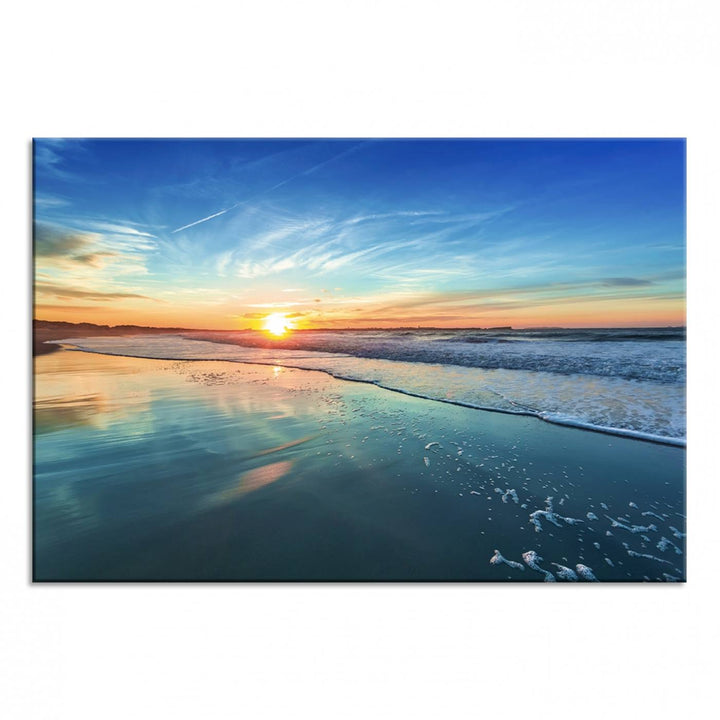 The Blue Sky and Beach Wall Art Canvas Print features a vibrant orange sky reflecting on wet sand.