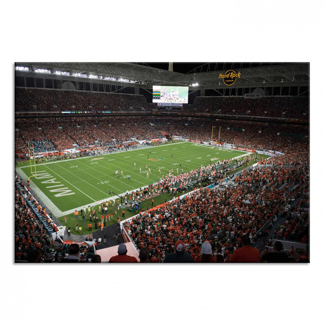 Aerial view of a Miami Hurricanes game at Hard Rock Stadium captured on canvas print, showcasing the teams on the field and fans in the stands.