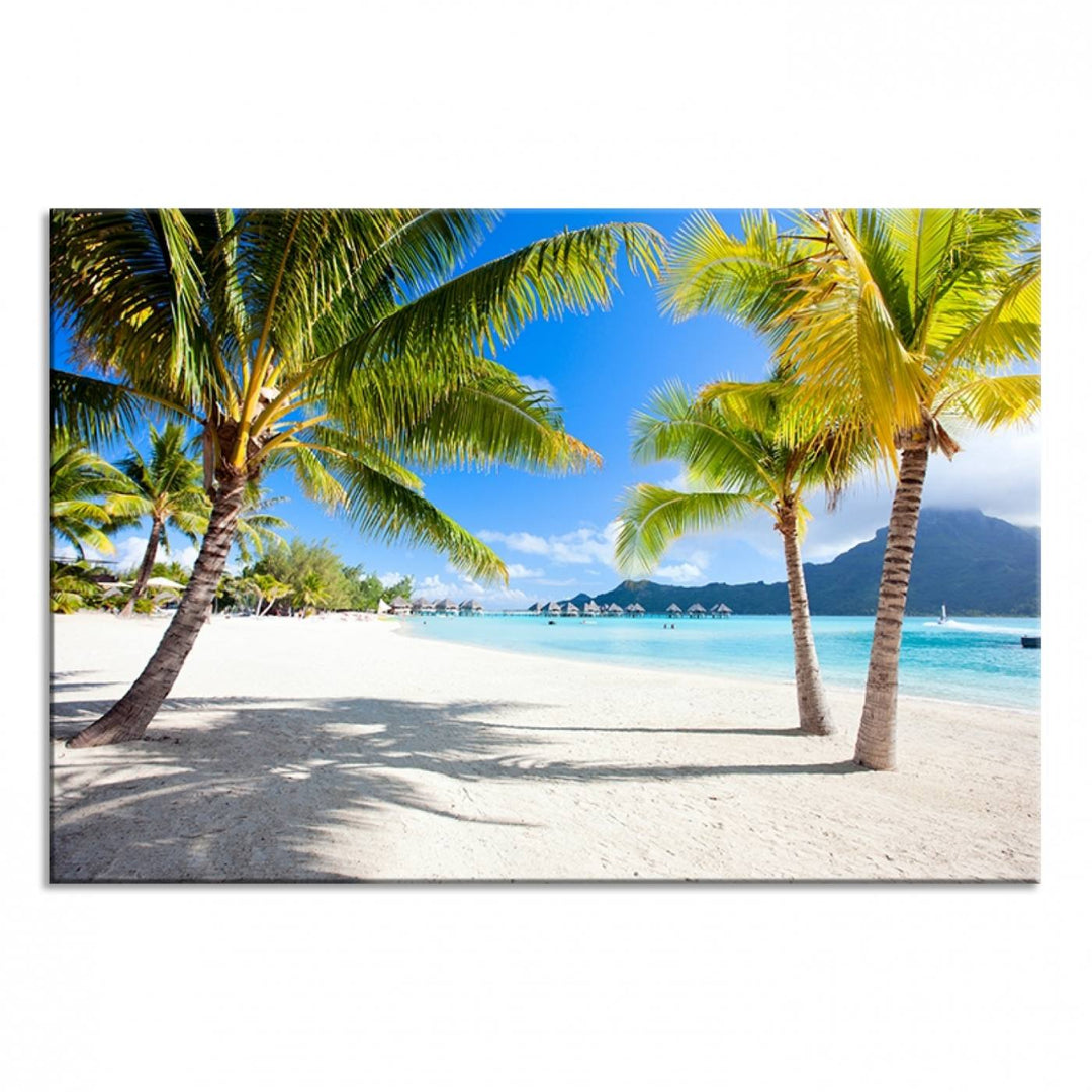 Blue Beach and Sea Wall Art Canvas Print: showcases a tropical scene with palm trees, white sand, and turquoise water.