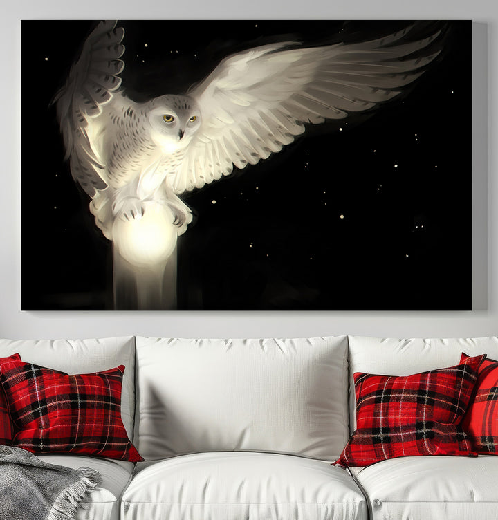 The Night Owl Art graces the wall with its depiction of a snowy owl on a glowing orb, perfect for modern decor.