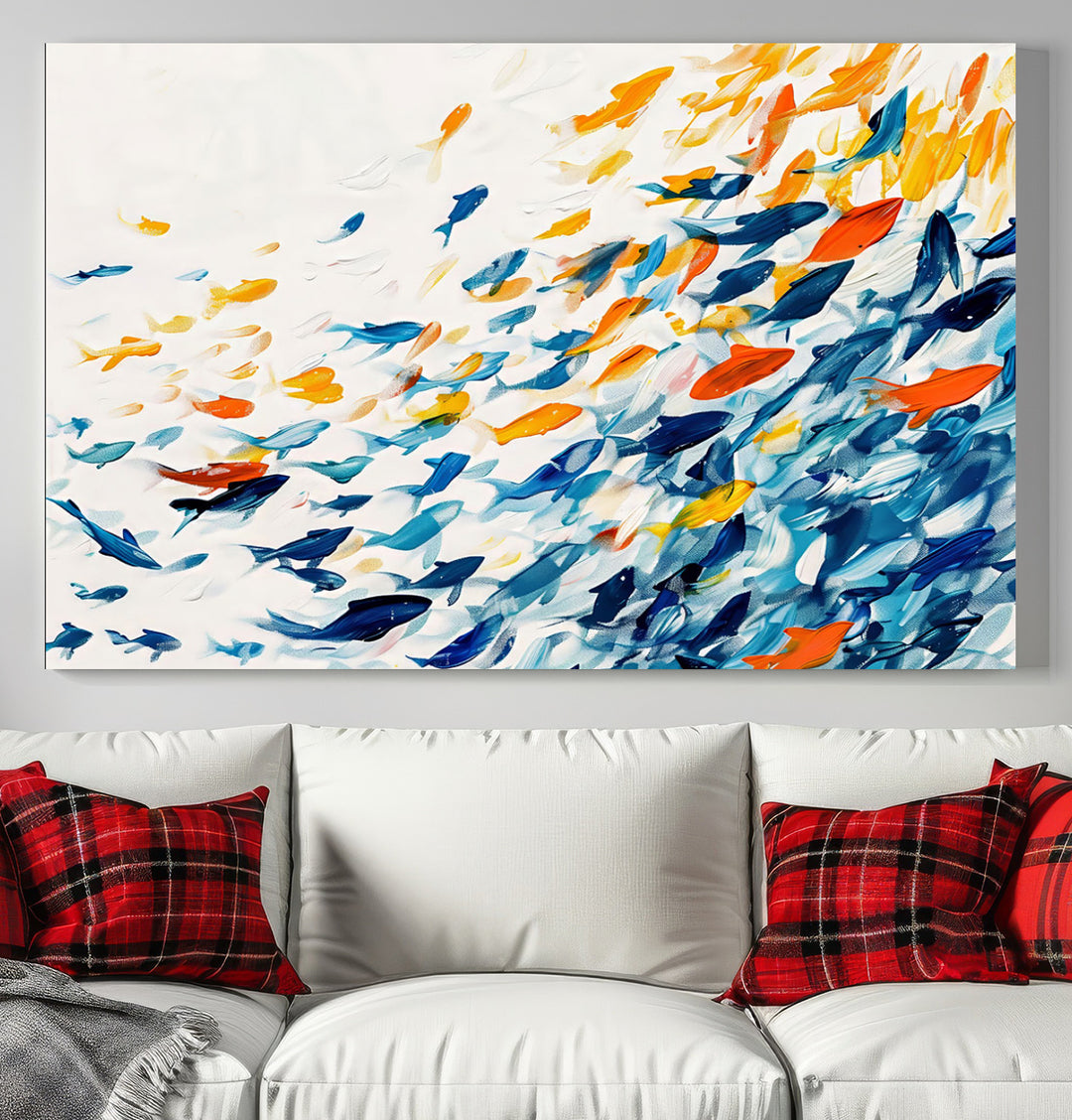 A colorful Abstract Fish Shoal Canvas Print hangs on the wall.