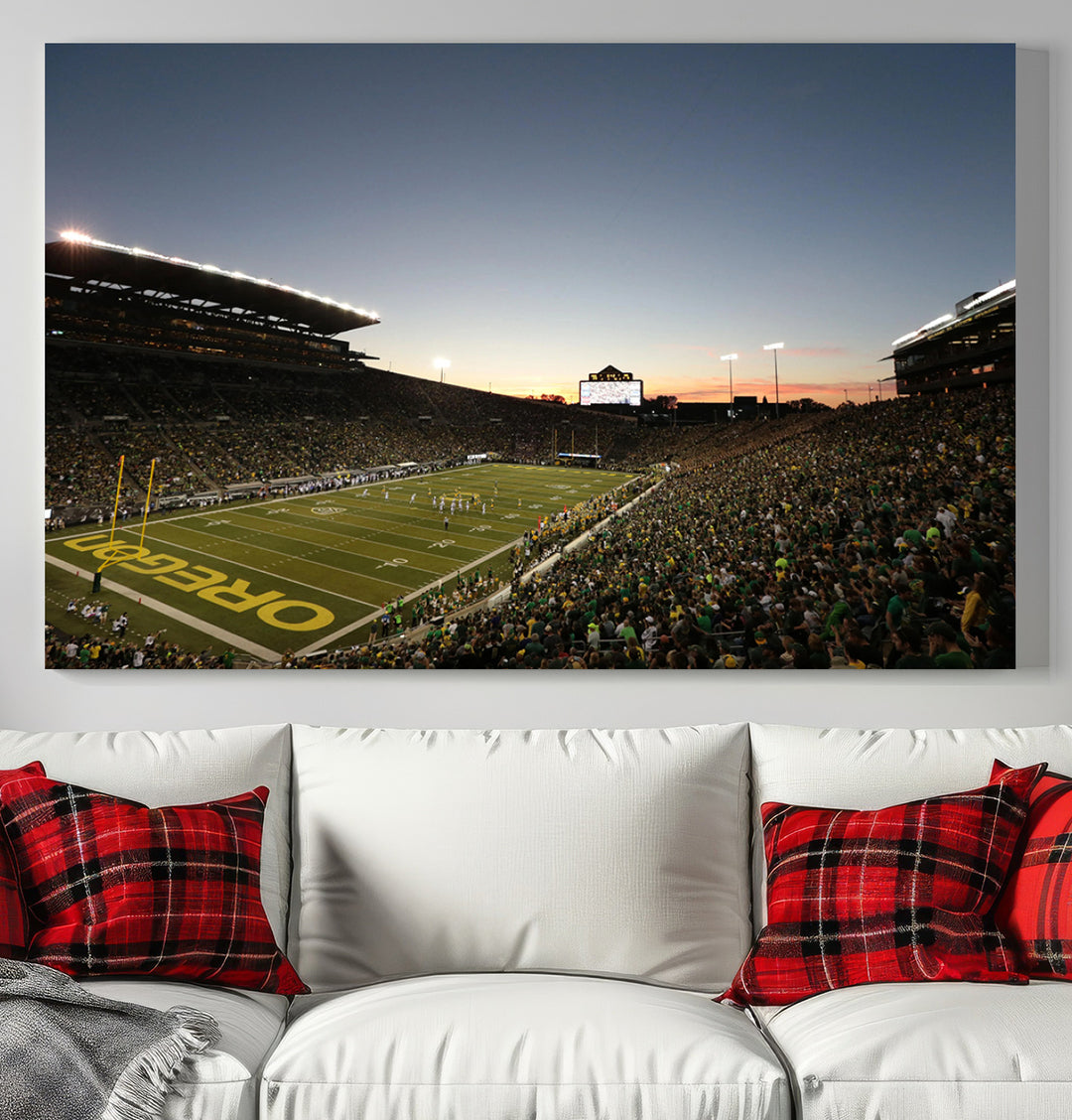 Canvas artwork depicting an Oregon Ducks football game at Autzen Stadium, capturing a sunset and packed stands.