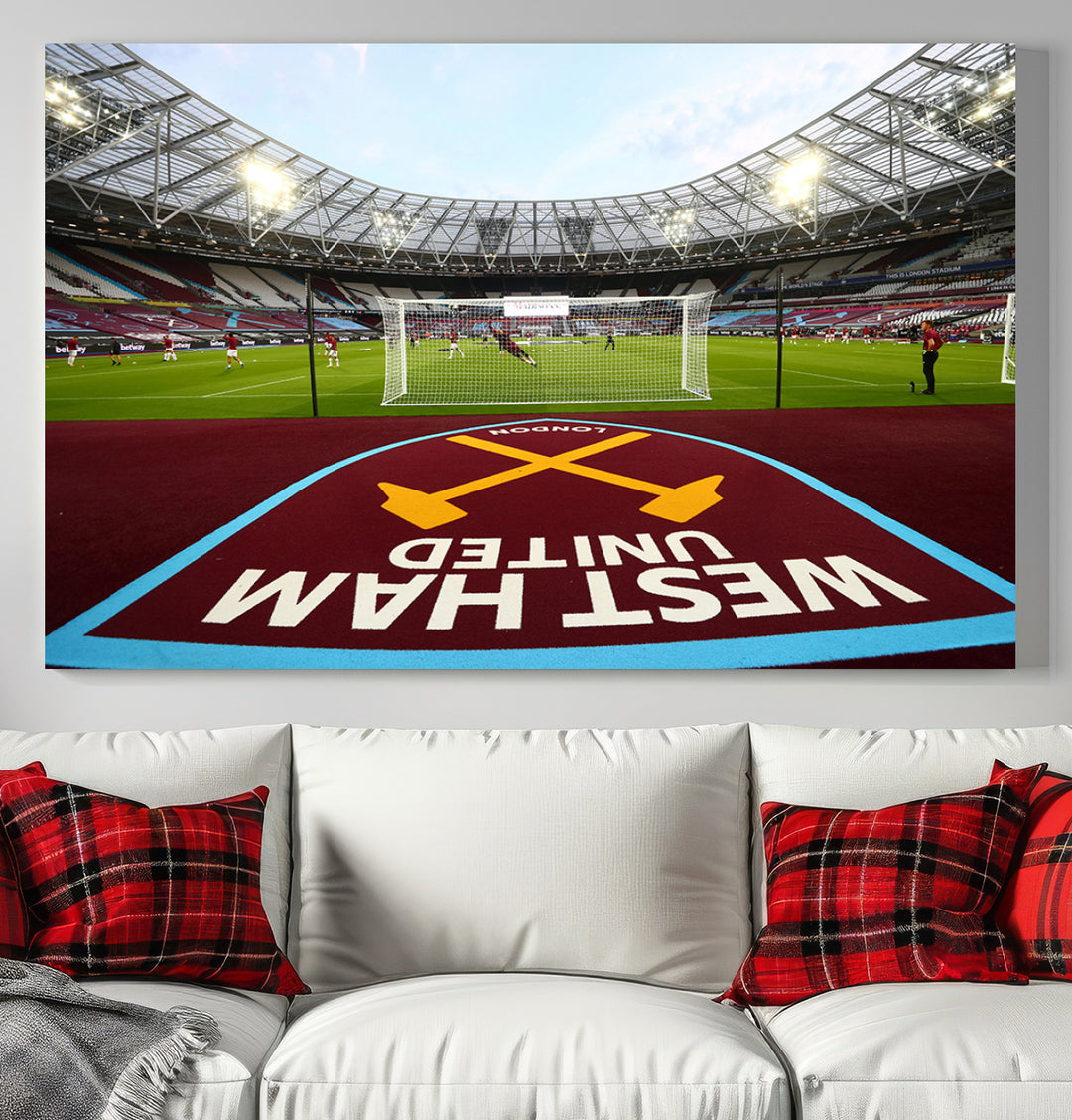 A soccer stadium with the West Ham United FC logo.