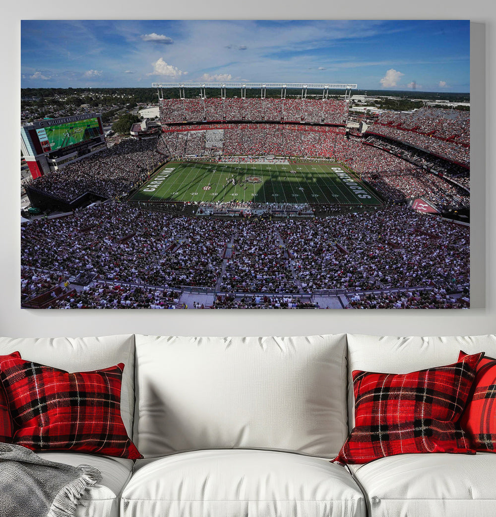 The wall art is a South Carolina Gamecocks print, showcasing Williams-Brice Stadium from a distance under clear skies.