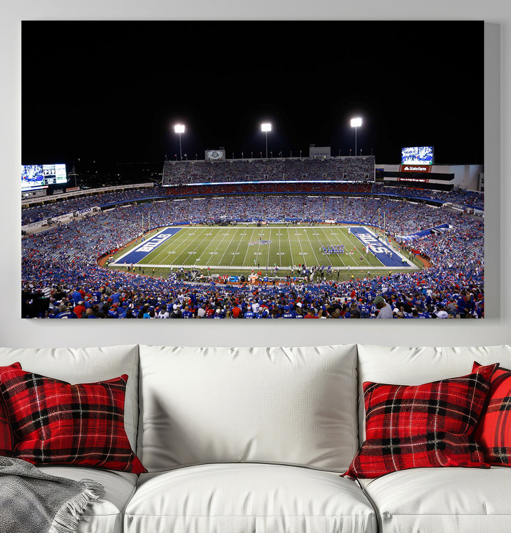 Buffalo Bills Stadium Wall Art depicts a packed football stadium at night, illuminated by bright field lights.