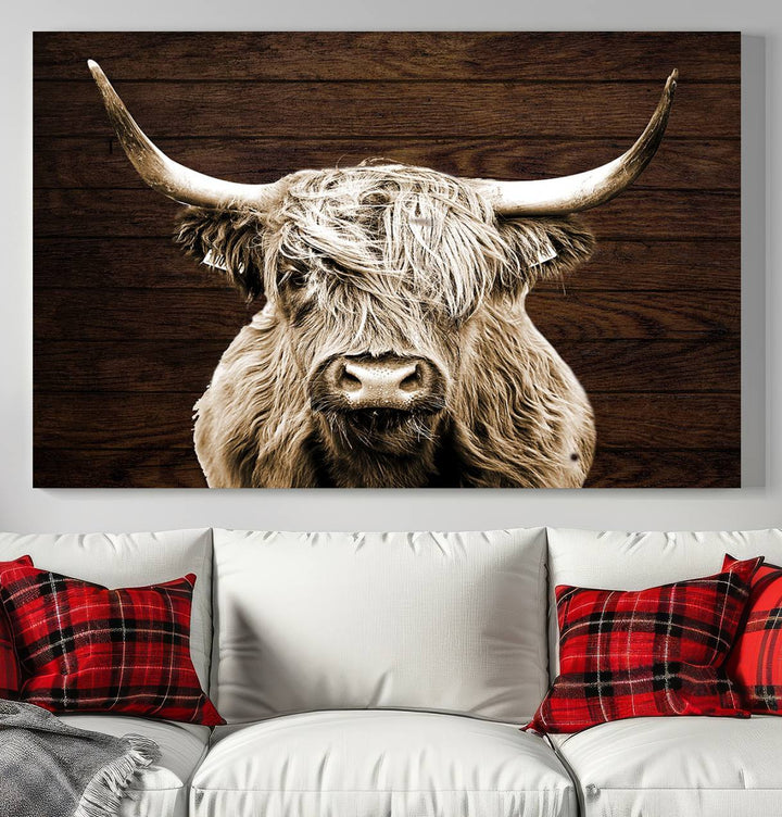 Highland Cow Wall Art Canvas Print: Majestic Scottish bull on rustic decor, ready to hang.