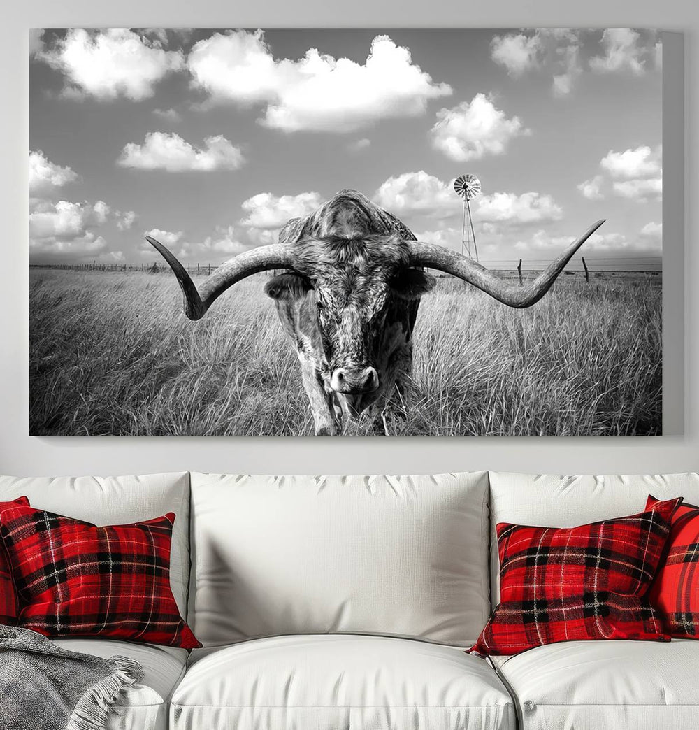 Longhorn Cow Field Canvas Print featuring rustic charm with a windmill backdrop.