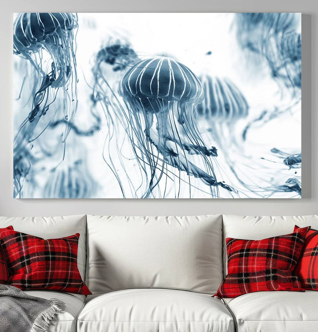 The "Abstract Jellyfish Wall Art Canvas Print" in high resolution is beautifully displayed as a triptych on a dark wall. Experience museum-quality canvas and enjoy free shipping with this stunning piece.