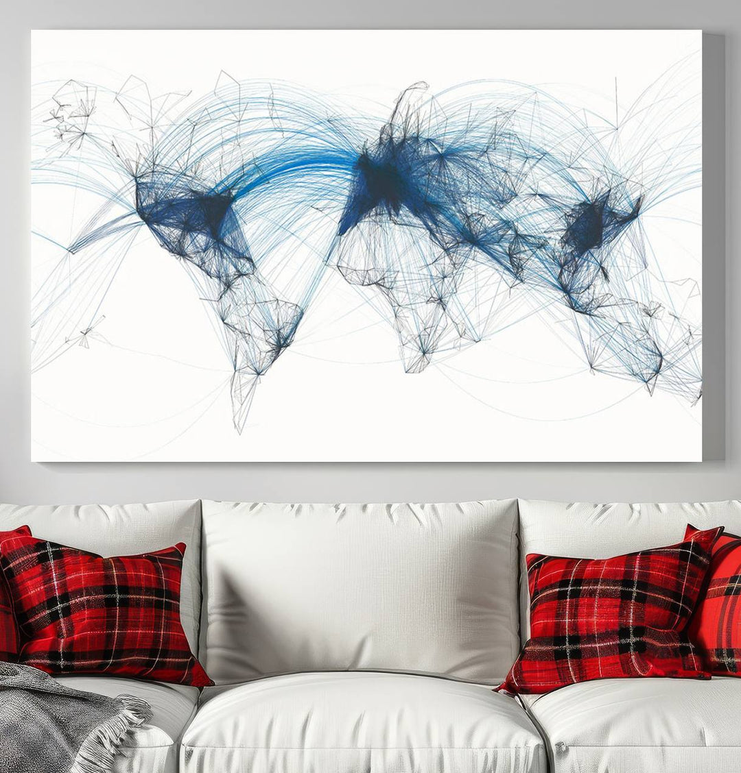 The Aviation Flight Map Wall Art is a set of three abstract panels featuring a world map with blue lines, resembling a flight map. Ideal for aviation enthusiasts, this ready-to-hang framed air traffic art print enhances the appeal of modern decor.