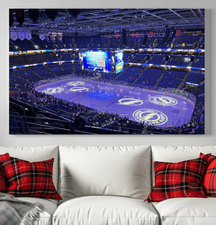 The wall art canvas print at Amalie Arena features team logos on ice, encapsulating the vibrant atmosphere of an NHL hockey stadium.