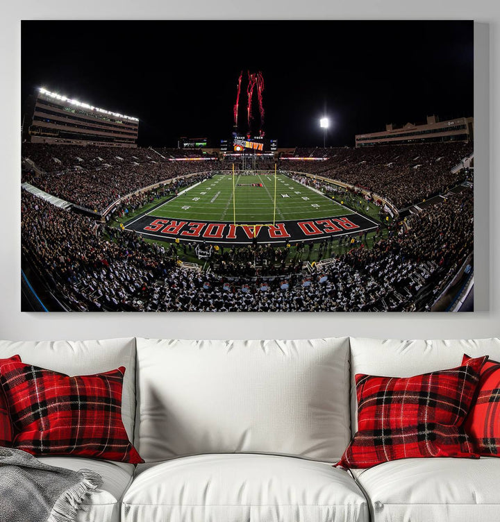 The wall features a Texas Tech Red Raiders Football Team Print on canvas, showcasing fireworks over a packed stadium at night.