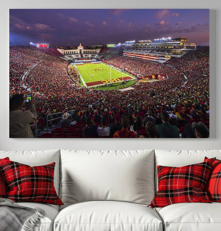 The vibrant wall art canvas print captures the USC Trojans playing under lights at dusk in LA Memorial Coliseum.