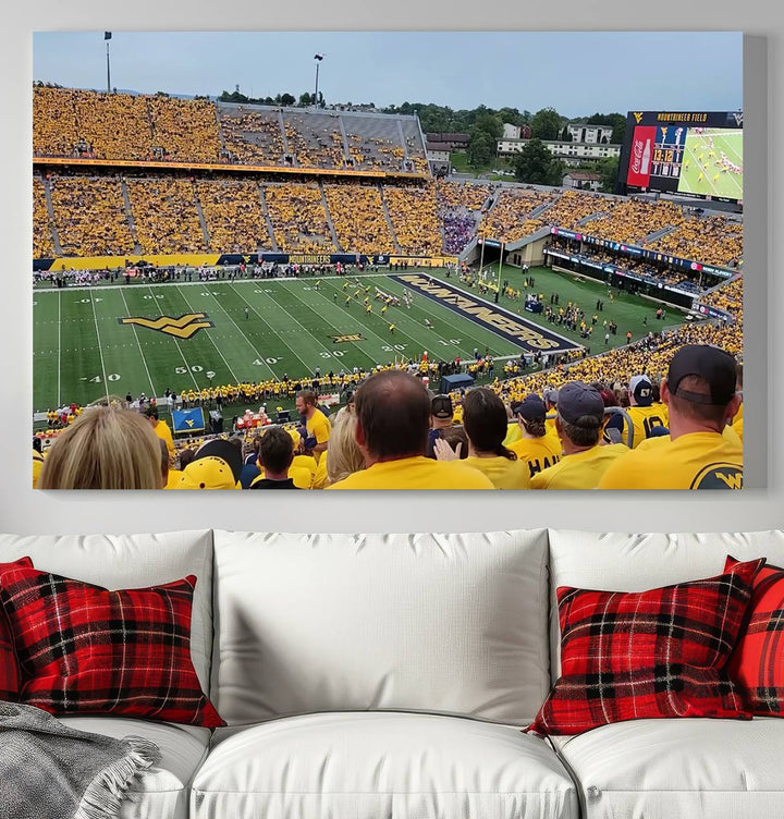 A Puskar Stadium canvas print decorates the modern living room shelf.