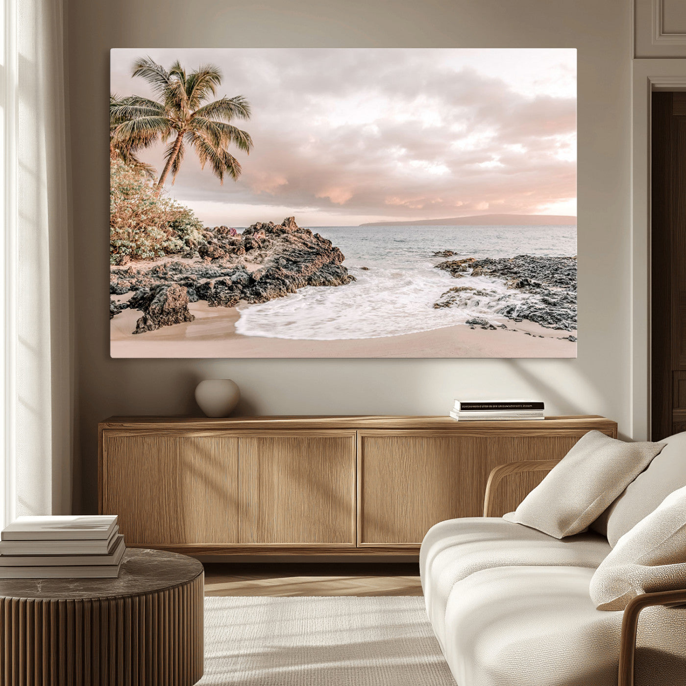 A peaceful beach scene with a palm tree and rocks, soft waves washing onto the shore under a soft pastel sky at sunset.