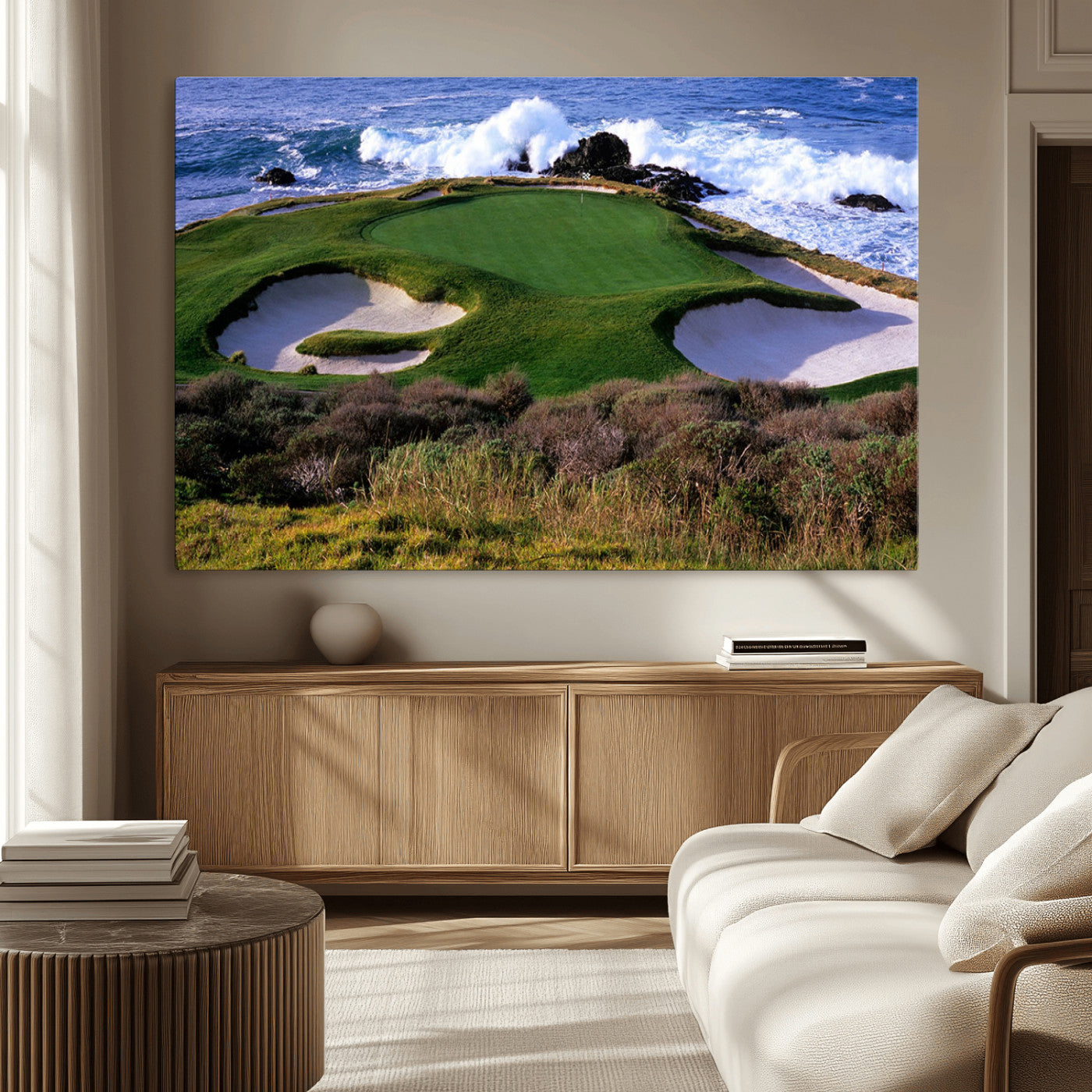 A scenic golf course located by the ocean, featuring a well-manicured green surrounded by sand traps and powerful ocean waves crashing on the shore.