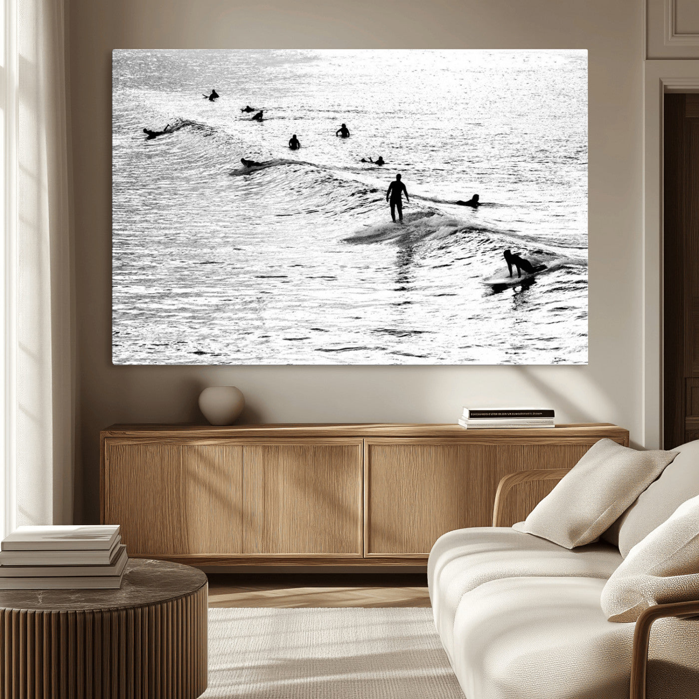 19970637-MGV-CV-36X24-Black and white artistic view of surfers riding and paddling on waves in the ocean, capturing the dynamic motion and energy of surfing