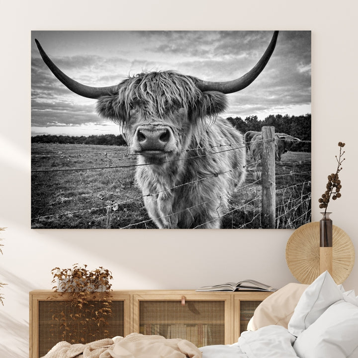 The "Scottish Highland Cow Canvas Wall Art Farmhouse Decor" adds a touch of rustic charm to your living room wall above the couch.