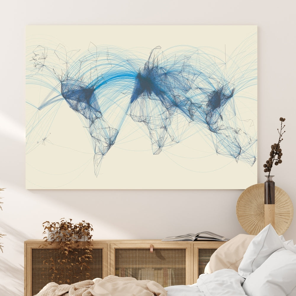 The Flight Routes Map art, featuring an abstract world map with blue connections representing global networks, is a three-panel canvas wall art piece.