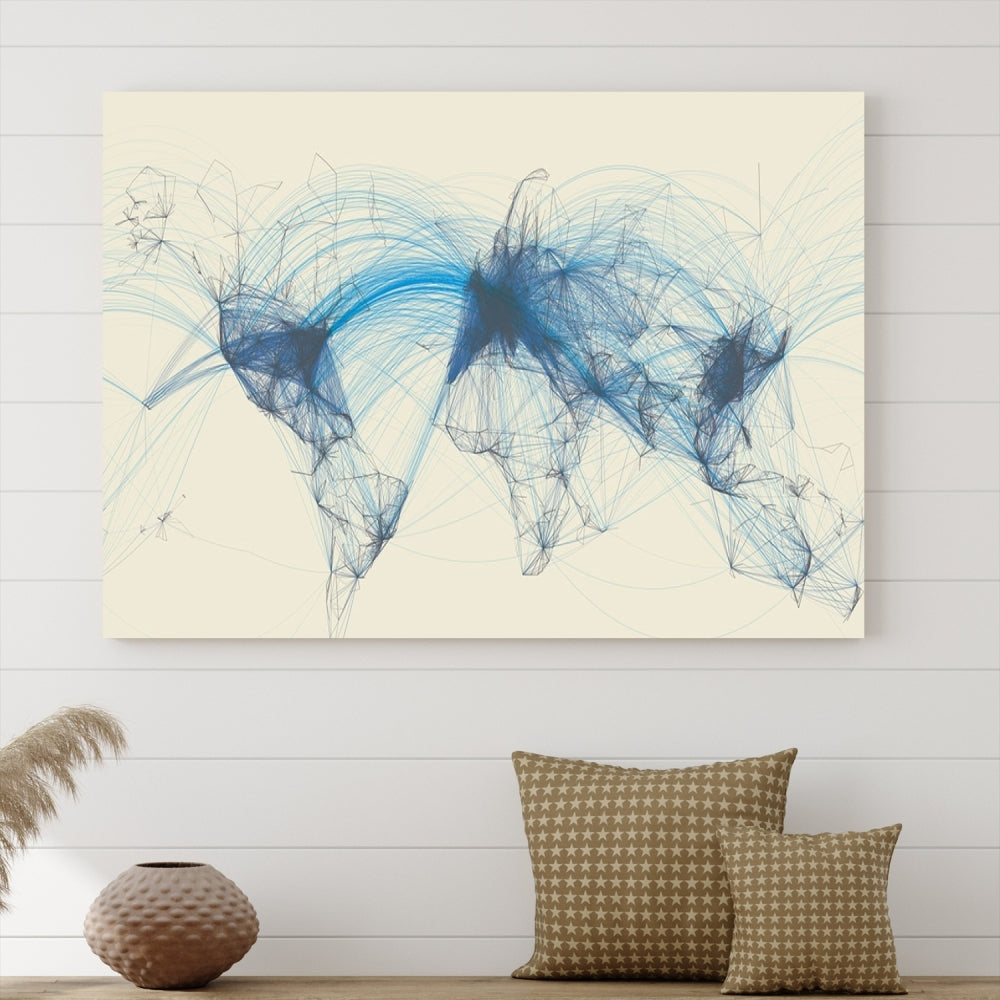 The Flight Routes Map art, featuring an abstract world map with blue connections representing global networks, is a three-panel canvas wall art piece.