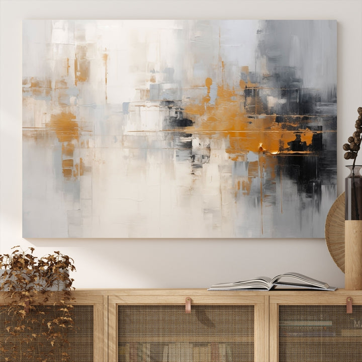 The Orange Pastel Abstract Wall Art Canvas Print, featuring a triptych of orange, white, and black hues, is elegantly displayed on museum-quality canvas.