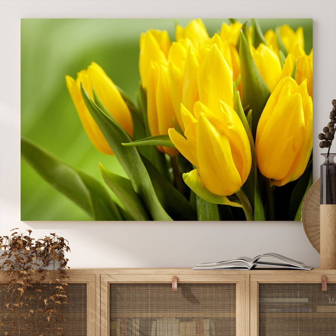 The Wall Art Yellow Tulips Canvas Print on a green background is featured.