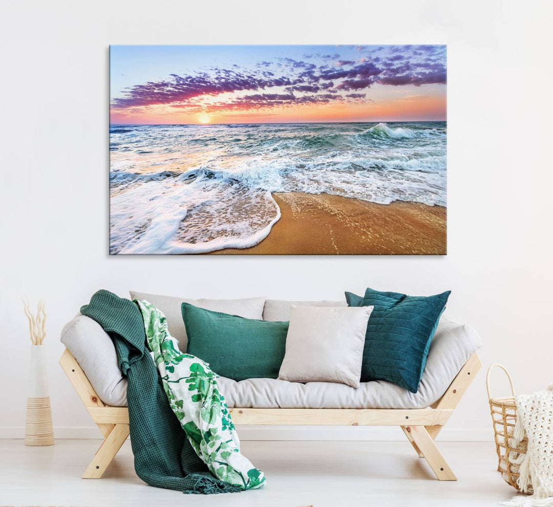 The Coastal Sunset Art Canvas Print features ocean waves beneath a vibrant sky in a stunning 3-panel seascape.