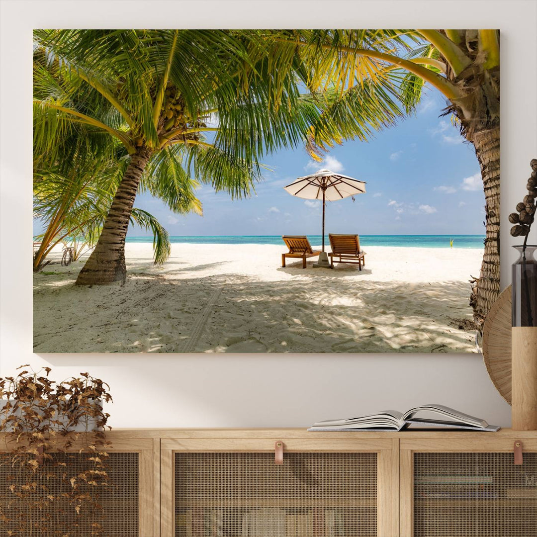 The canvas art print titled Lounge Chairs Palm Trees on Tropical Beach offers free shipping.