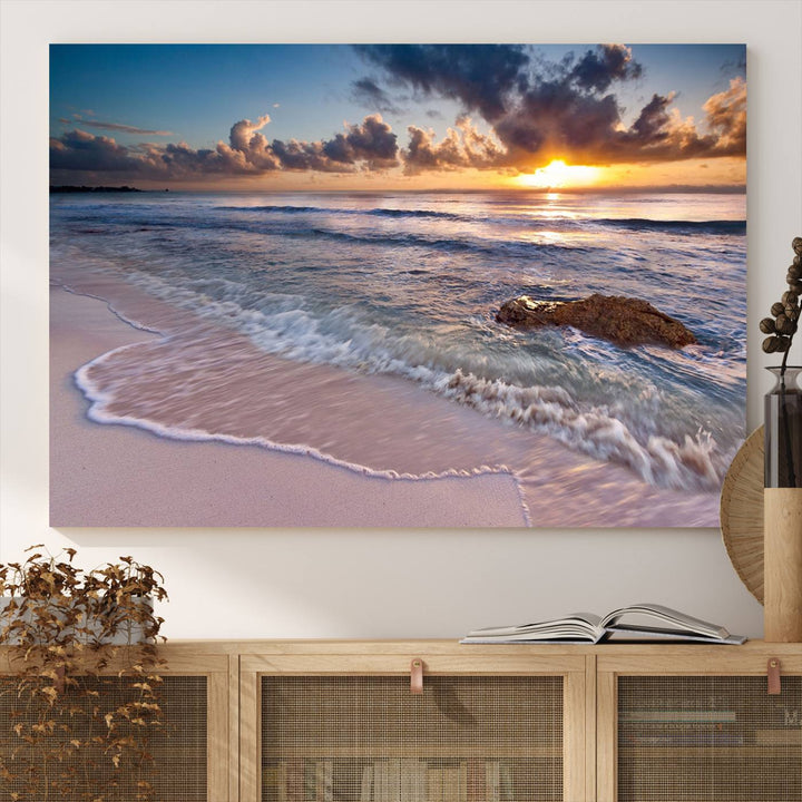 The room features a Sunset Beach Waves Canvas above the counter.