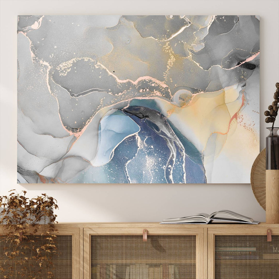 Gray Marble Fluid Effect Abstract Canvas with swirls of gray, gold, and blue.