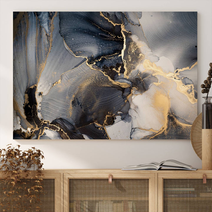 A Modern Marble Fluid Effect Abstract Wall Art with black, white, and gold swirls hangs in a modern kitchen.