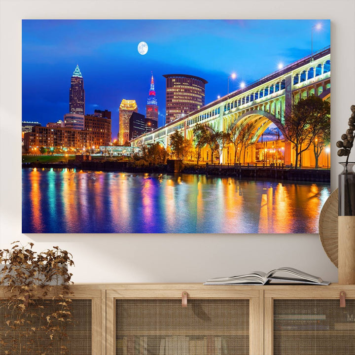 A Cleveland Night Skyline Wall Art on museum-quality canvas showcases a bridge and illuminated buildings.