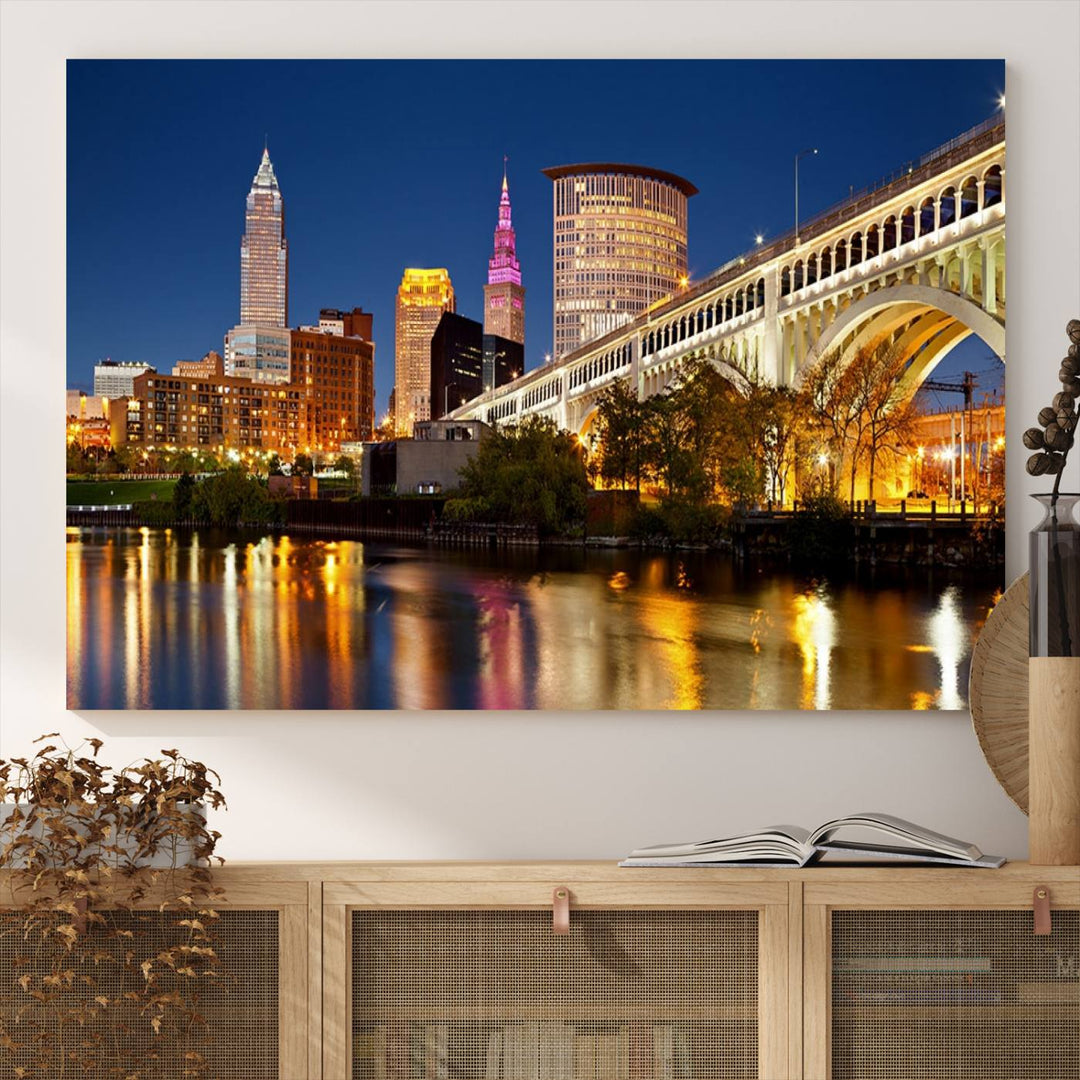 The Cleveland City Lights Canvas showcases a lit-up bridge and cityscape at night.