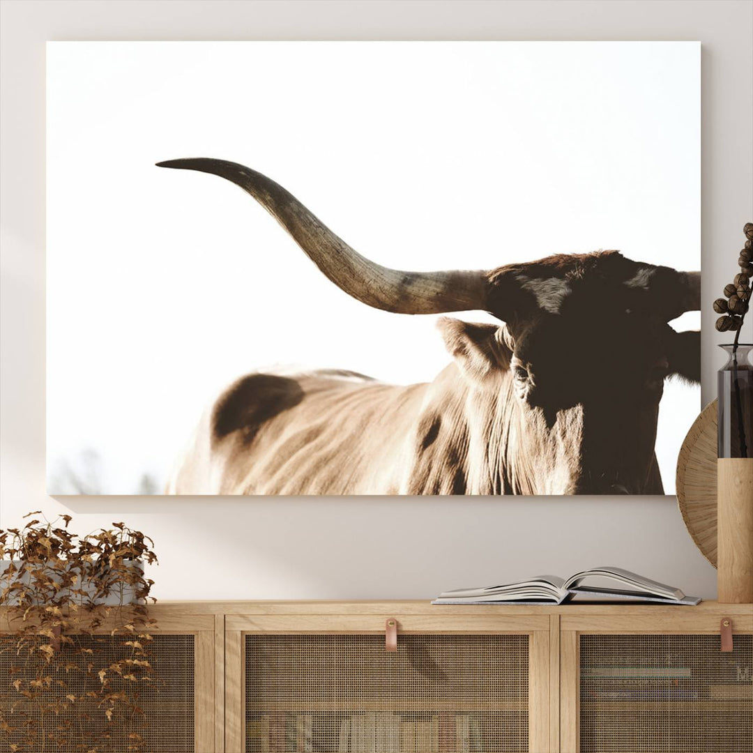 A 3-panel Texas Longhorn canvas adds a touch of rustic Western decor.