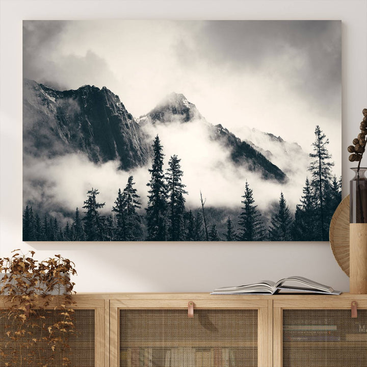 A large foggy mountain forest canvas print hangs prominently in the room.