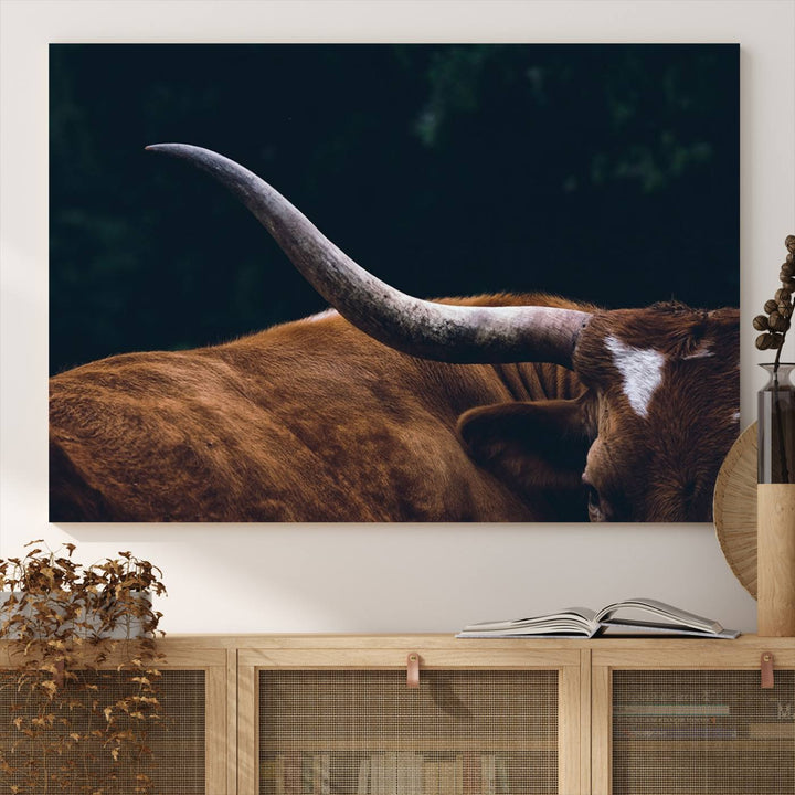 The kitchen dining area features a Texas Longhorn Bull wall art.