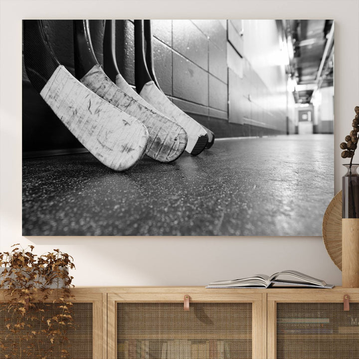 Ice Hockey Wall Art Canvas Print features a UV-protected black and white photo of hockey sticks.