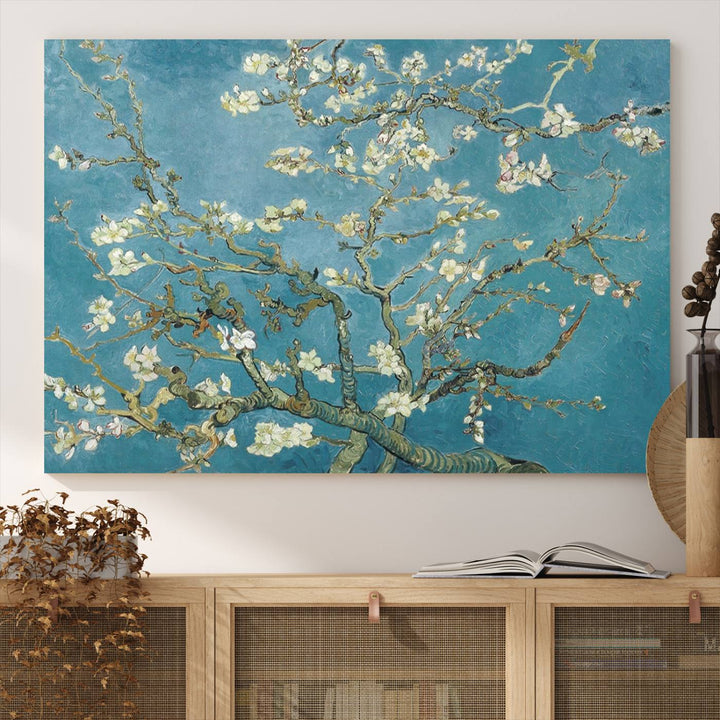 The wall art, Vincent Van Goghs Almond Blossom, stands out with its vibrant depiction against a serene blue background.