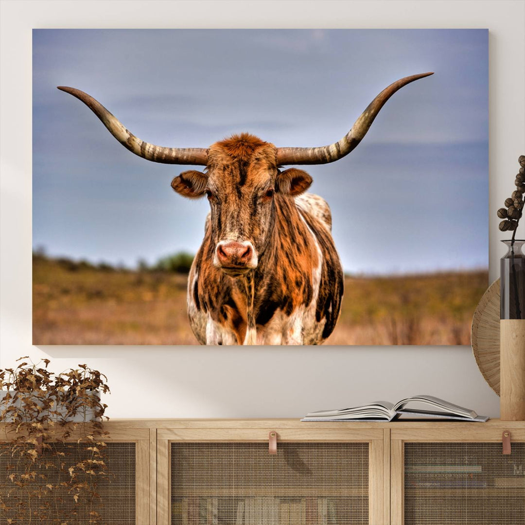 The Texas Longhorn Wall Art Print is displayed in a stylish living room.