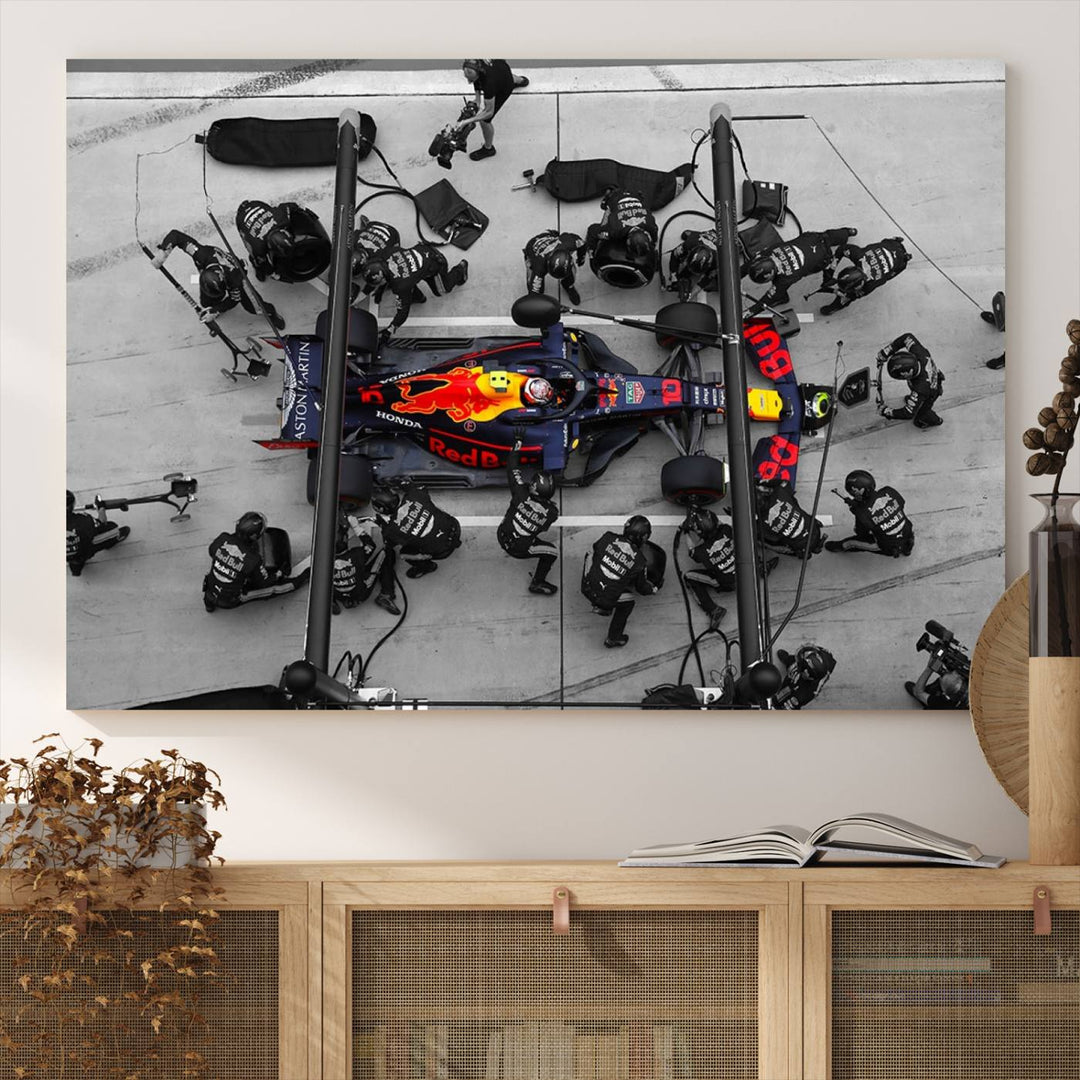 Red Bull Formula 1 Canvas Wall Art Print: An aerial view of a Formula 1 pit stop featuring a Red Bull car on premium canvas.