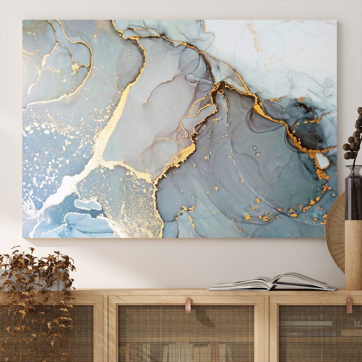 A blue and gold marbled Large Abstract Marble Wall Art Canvas Print hangs overhead.