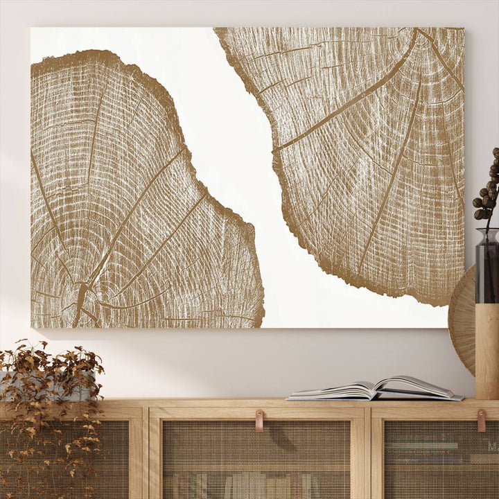 The rustic wall art features two large tree rings, beautifully framed and displayed to create a nature-inspired décor.