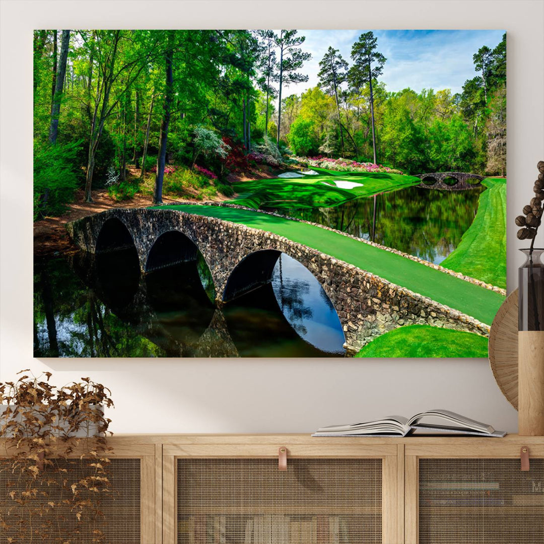 The wall art from Augusta National Golf Club showcases a panoramic bridge set against rich, lush greenery on a framed triptych canvas.