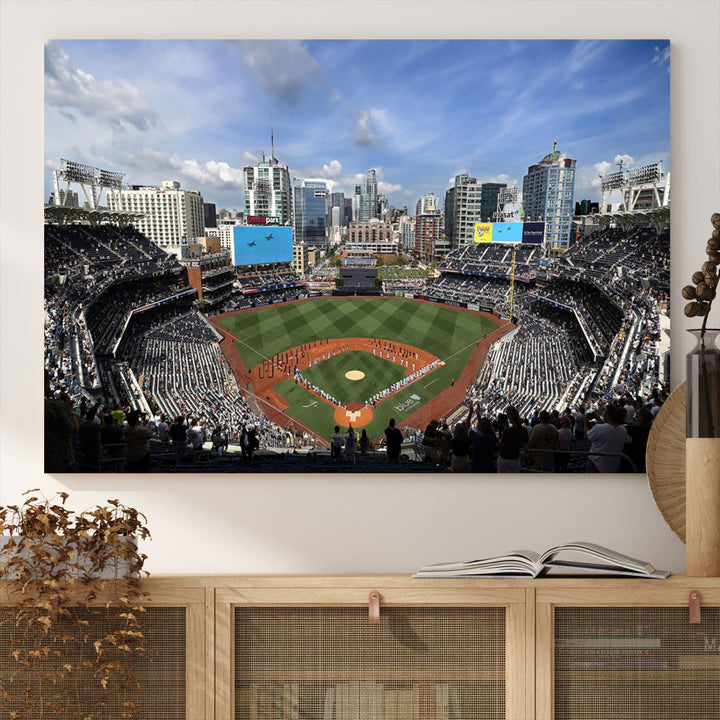 The San Diego Padres Baseball Canvas Print of Petco Park enhances the modern kitchen-dining area.