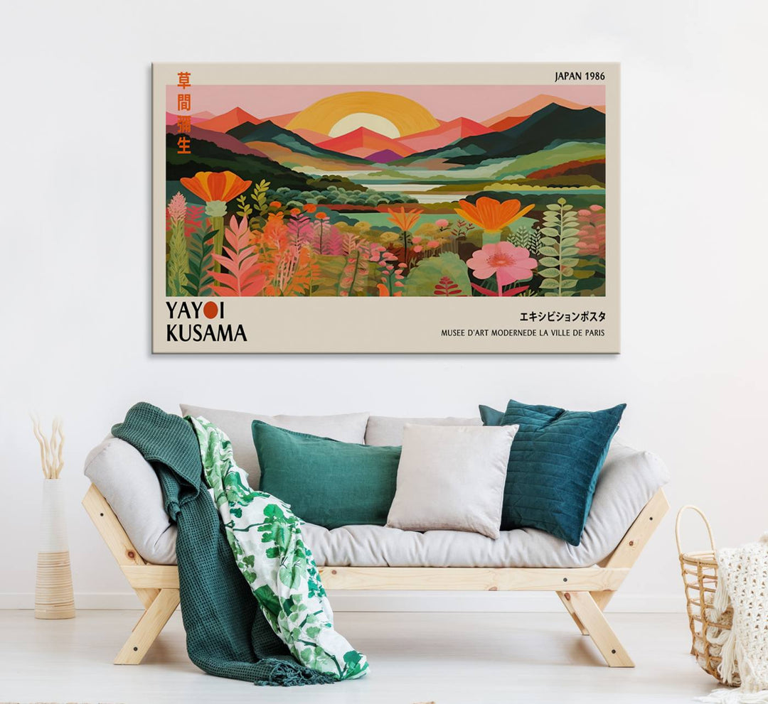 The Yayoi Kusama Landscape Canvas Print, featuring vibrant floral mountains and sunset scenery, enhances the room.