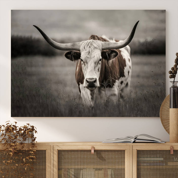 The Texas Longhorn Cow Canvas Wall Art Print adds a rustic touch to a living room.