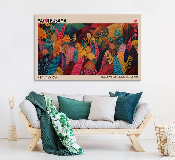 A Yayoi Kusama Wall Art Canvas Print is framed by a window and potted plant.