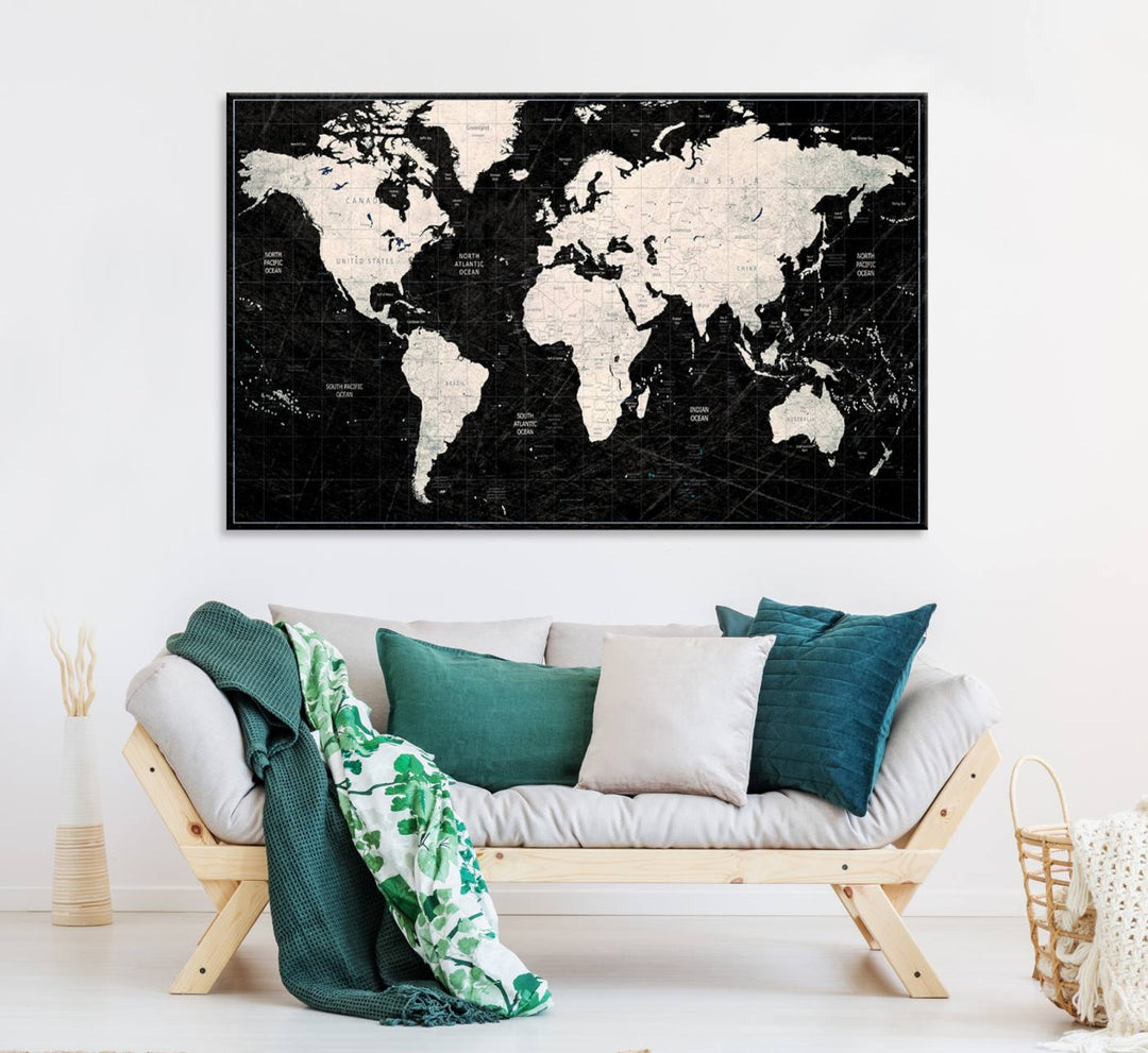 The Black & White World Map Canvas Wall Art, a giclee print, elegantly decorates the wall.