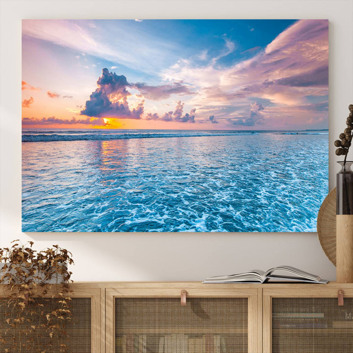 An Ocean Sunset Canvas Wall Art depicting a vibrant sky and rolling waves.