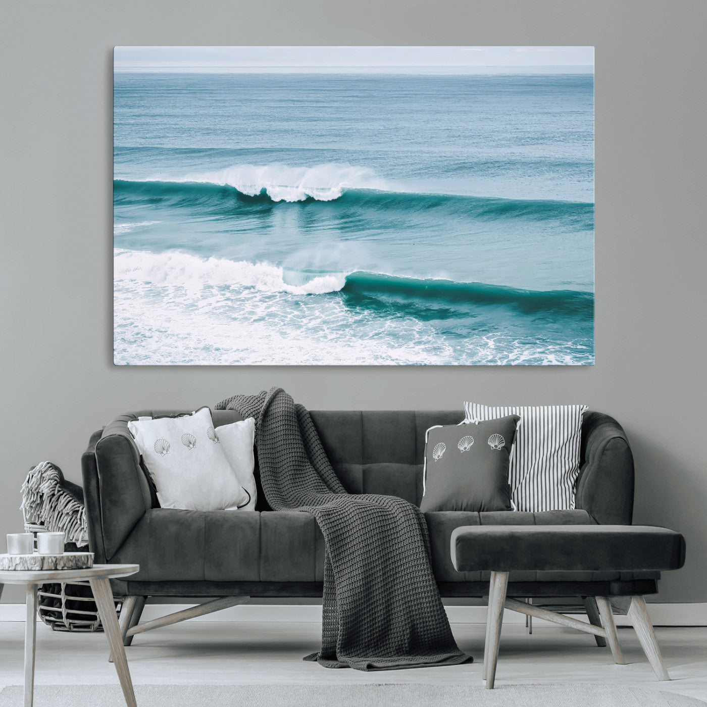 Powerful ocean waves rolling towards the shore, their turquoise hues blending with white sea foam under an open horizon, capturing the essence of the ocean's movement.