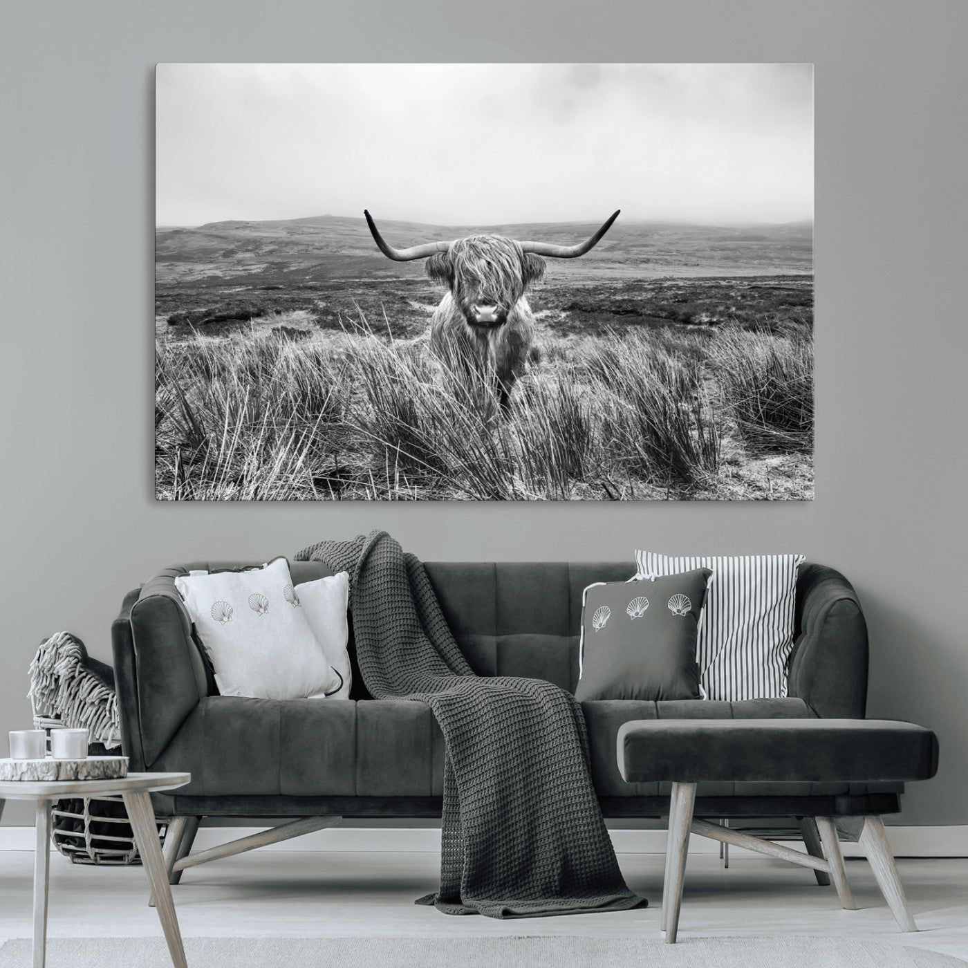 A black and white portrait of a Highland cow in a foggy Scottish countryside, capturing a rustic aesthetic and tranquil farm escape.